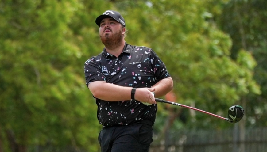 Lamb flirts with record to share PNG Open lead
