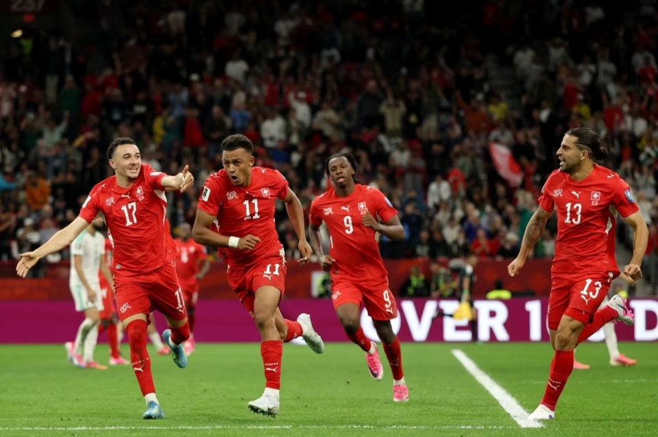 Akanji react after playing key roles in guiding their nation to a first knockout win in more than seven decades
