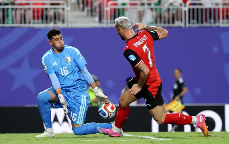 Sasa scored a last-gasp equaliser as Austria pipped Algeria to the runners-up spot in Group